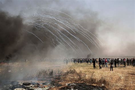 In Gaza, women protest among the burning tires and smoke