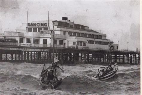 Fisherman's lifeboat the Sir William Priestley tows a Morecambe boat in rough sea along side ...