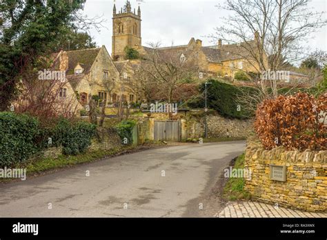 The English Cotswold village of Blockley with a view of the parish church of St Peter & St Paul ...