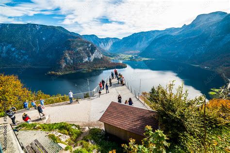 Hallstatt Skywalk World Heritage View (Welterbeblick). Tourists visiting Skywalk platform ...