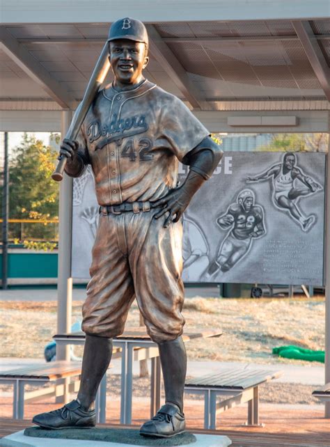 Destroyed Jackie Robinson statue: Man charged in theft, other suspects ...