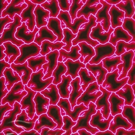 a red and black animal print wallpaper with some pink lights in the dark behind it