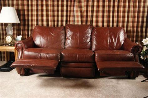 61: Leather Lazy Boy sofa w pull wallaway seats : Lot 61