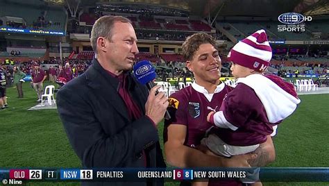 Queensland hero Reece Walsh cuddles daughter, two, and calls her his 'rock' after appearing to ...