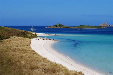 Tresco Island and Beyond with a sailing boat in the distance