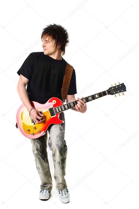 Rocker with electric guitar — Stock Photo © shivanetua #4364663