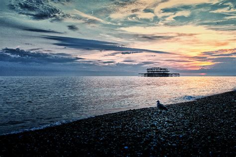 Sunset On Brighton beach Photograph by Tim Ellis - Fine Art America