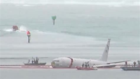 WATCH: US Navy plane with nine onboard overshoots runway, lands in ocean