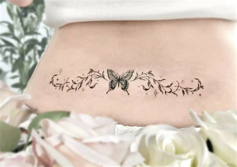 Lower Back Tribal Butterfly Tattoos