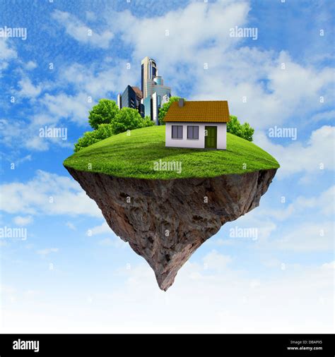 A piece of land in the air with house and tree Stock Photo - Alamy