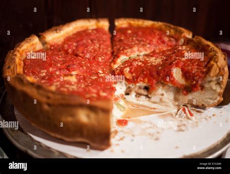 A Chicago-style, deep dish stuffed pizza from Giordano's Pizzeria in ...