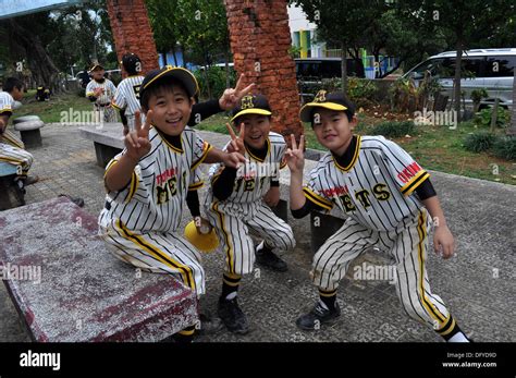 Boy playing baseball japan hi-res stock photography and images - Alamy