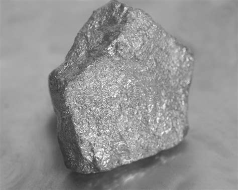 Silver Nugget on Gray Background Stock Photo - Image of power, silver: 112509732