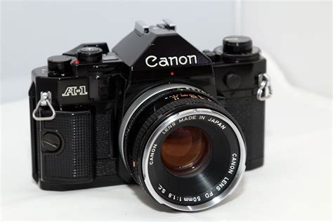 Canon A-1 SLR | Vintage cameras, Antique cameras, Camera