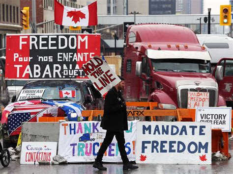 Canadian Trucker Convoy Blocks Key Border Crossing As Protests In ...