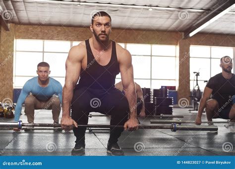 Portrait of Young Strong Man Training with Barbell Stock Image - Image ...