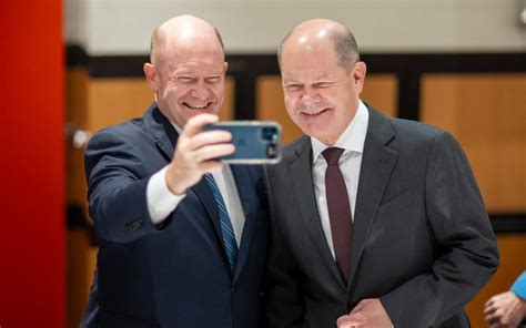 Olaf Scholz meets ‘doppelganger’ US senator ahead of talks with Joe Biden