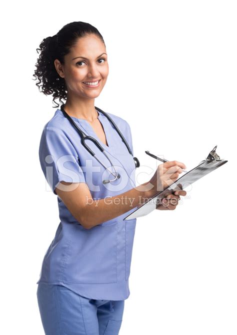 Female Nurse Writing On A Clipboard Stock Photo | Royalty-Free | FreeImages