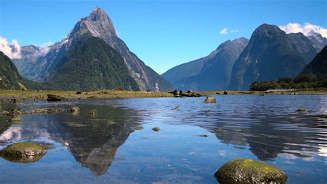 Milford Sound with mountains and reflective lake and clouds image - Free stock photo - Public ...
