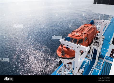 Cruise ship emergency safety rescue boat on deck Stock Photo - Alamy