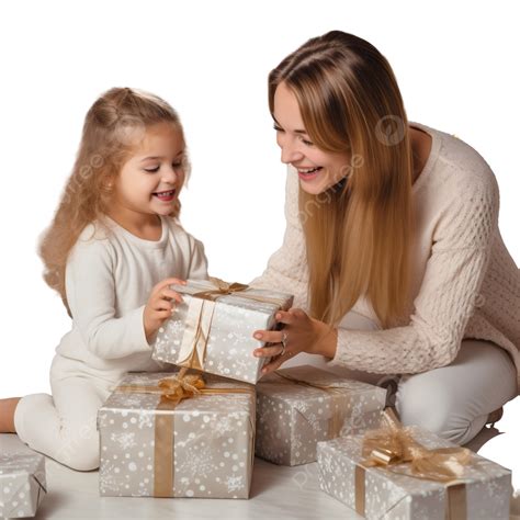 Happy Mother And Her Little Daughter Unpack Gift Box Near The Christmas Tree At Home, Young ...