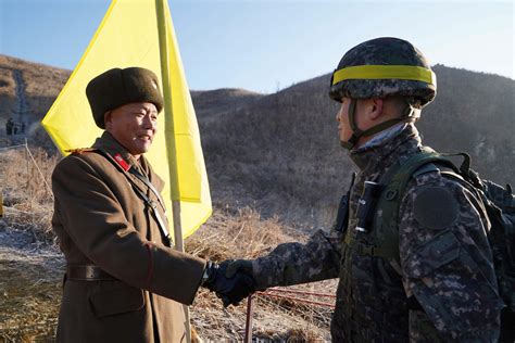 North and South Korea Troops Cross Border For First Time Since War, This Time for Peace - Newsweek