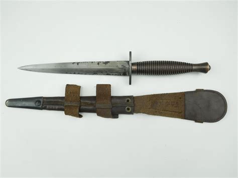 FAIRBAIRN SYKES TYPE FIGHTING KNIFE WITH SCABBARD