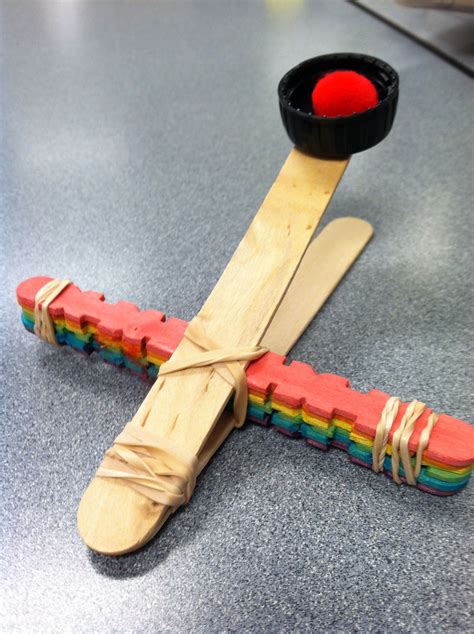 DIY catapult out of Popsicle sticks and rubber bands.. Easy and fun ...