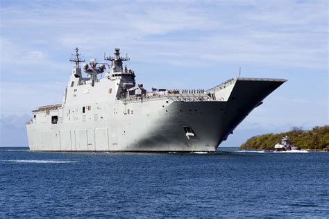 HMAS Canberra (L02/LHD), a Royal Australian Navy landing helicopter dock ship, arrives at Joint ...