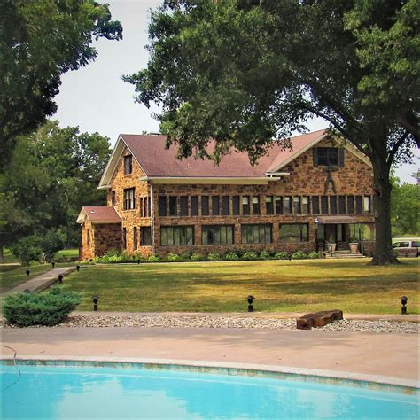 Old ranch mansion behind a swimming pool Osage County Oklahoma, Osage Nation, Pawhuska, Drummond ...