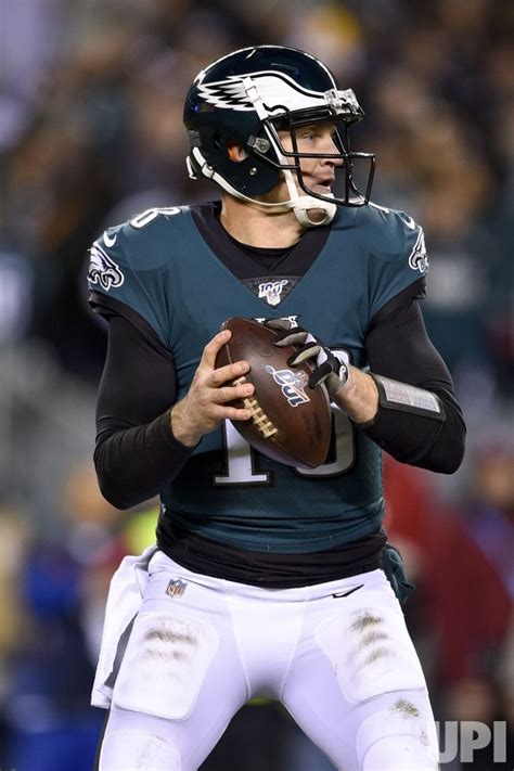 Photo: Eagles' Josh McCown (18) looks to throw the ball ...