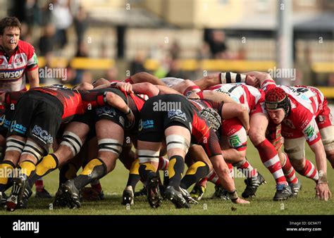 The Newport-Gwent Dragons and Gloucester Rugby players take part in a ...