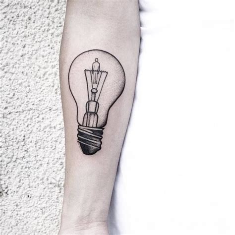 a light bulb tattoo on the left inner forearm and arm is shown in black ink