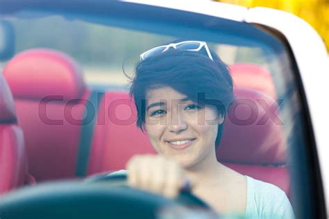 Woman Driving a Convertible | Stock image | Colourbox