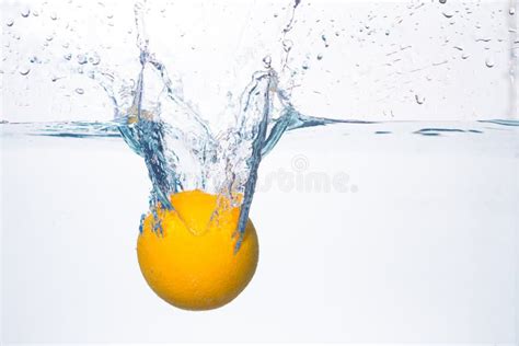 Orange splash in water stock photo. Image of background - 51171928