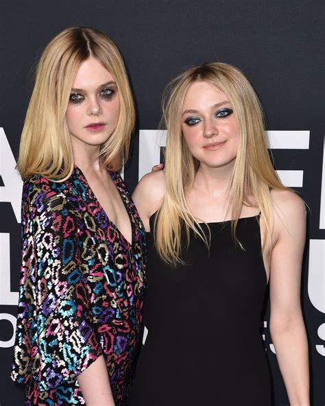 Elle and Dakota Fanning Wear Glitter Eye Makeup at the Saint Laurent Fall 2016 Menswear Runway ...