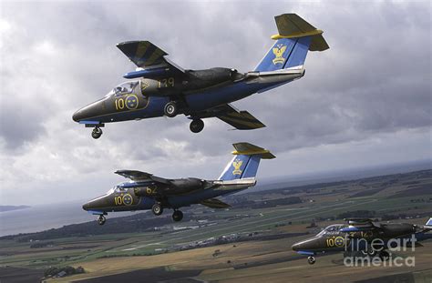 Saab 105 Jet Trainers Of The Swedish Photograph by Daniel Karlsson ...