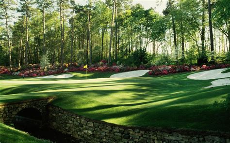 Amen Corner. Blooming azaleas line the 13th green as the sun filters through ... | Masters golf ...