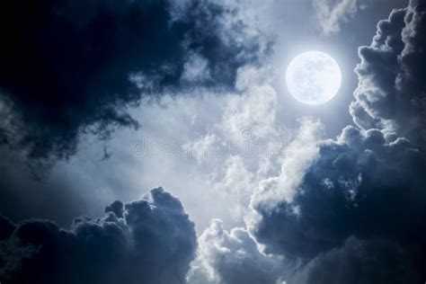 Dramatic Nighttime Clouds And Sky With Beautiful Full Blue Moon Stock Photo - Image: 53660009