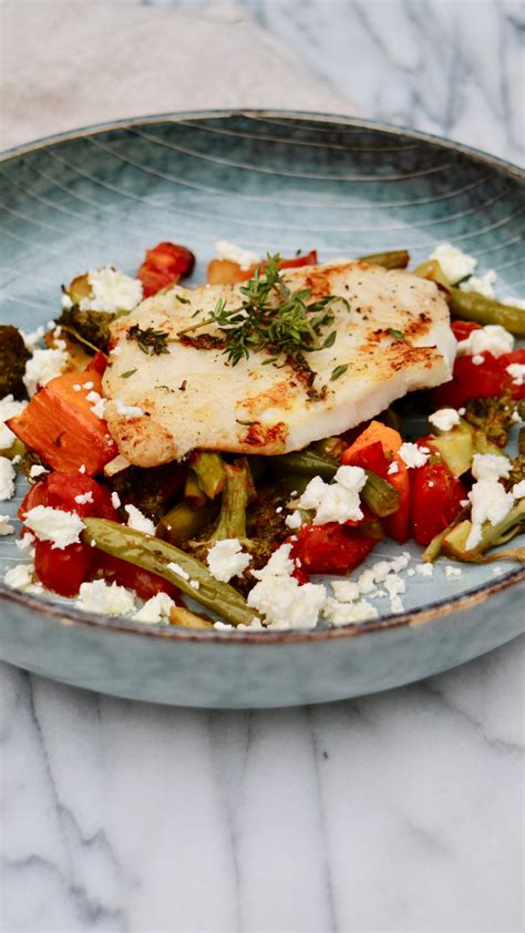 Fried Sheepshead fish on a green and red salad with Feta cheese – Scandinavian Simple Eating