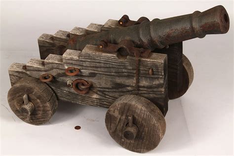 Lot 519: Small Iron cannon with oak carriage | Case Auctions