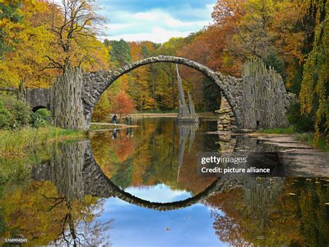 dpatop - 07 November 2023, Saxony, Kromlau: The Rakotzbrücke bridge ...