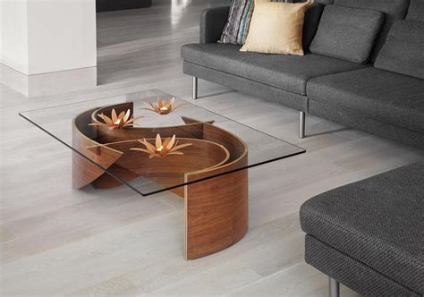 The Wave Coffee Table combines wood and glass into a uniquely modern piece of furniture and is ...