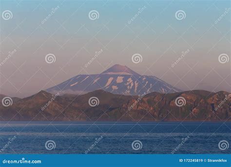 View on a Kunashir Island with Volcano Tyatya from the Sea Stock Image - Image of island ...