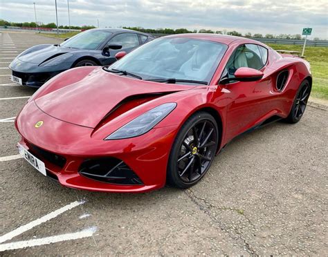 Lotus Emira Magma Red (1080x849) source: Dealer visit to Hethel - 9GAG