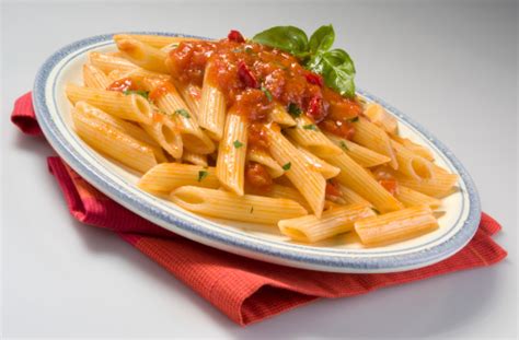 Penne Rigate With Tomato Sauce Alla Napolitana Stock Photo - Download ...