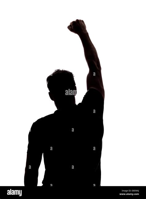 Fist in air in silhouette hi-res stock photography and images - Alamy