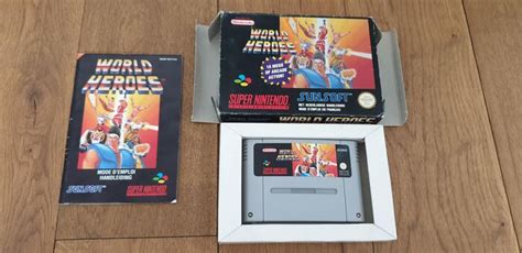 Nintendo SNES - World Heroes - Video games - In original - Catawiki