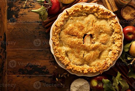 Apple pie decorated with fall leaves 15755102 Stock Photo at Vecteezy