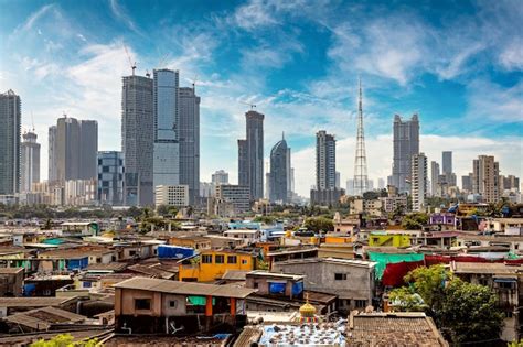 Premium Photo | Views of slums on the shores of mumbai, India against the backdrop of ...